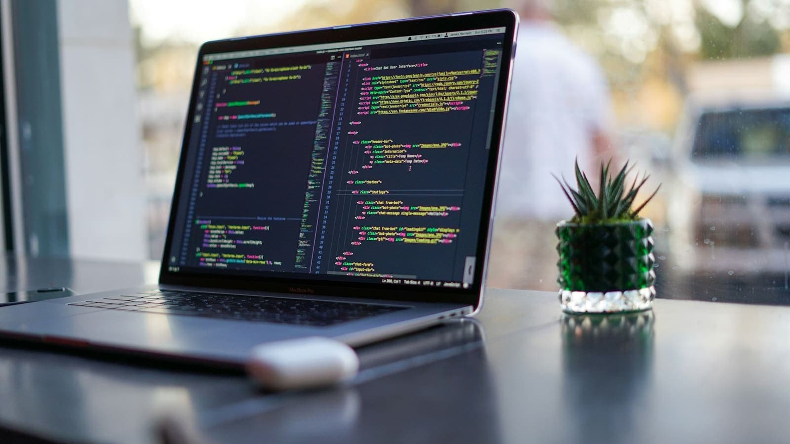 Laptop showing website source code during performance optimisation